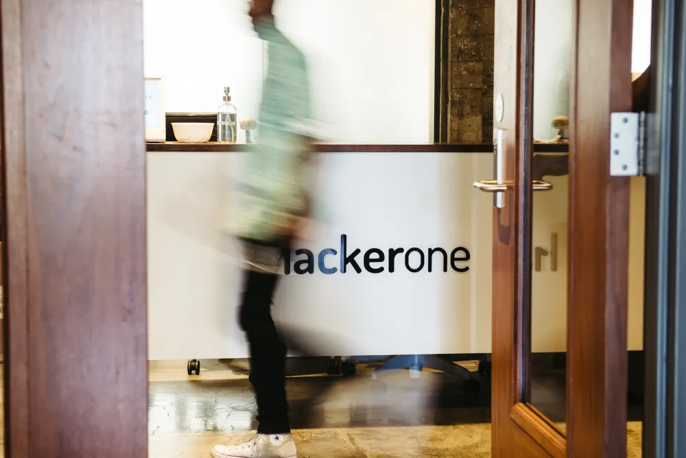 HackerOne logo on front desk in office