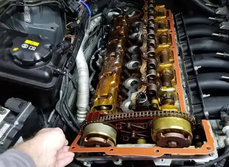 bmw valve cover gasket leak symptoms